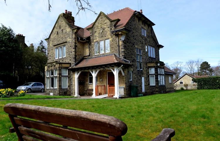 A stone house set in a large garden at Leylands Lane, Bradford BD9 5QU