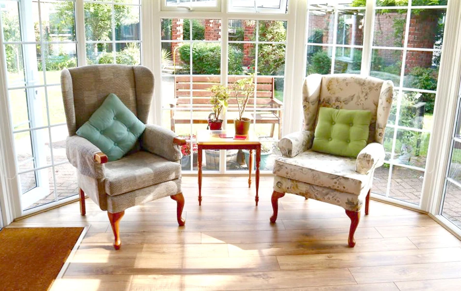 Bright and sunny communal lounge where residents can relax and catch up with friends and family