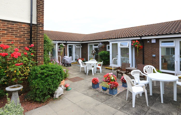 Patio area at the rear of Abbeyfield House, Basildon SS14 1PG.jpg