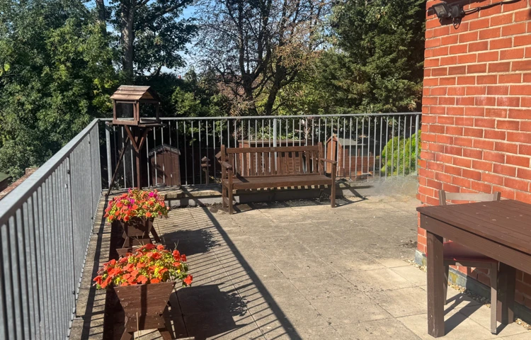 Bright And Sunny Outdoor Area For Residents To Enjoy At Abbeyfield House, Southampton