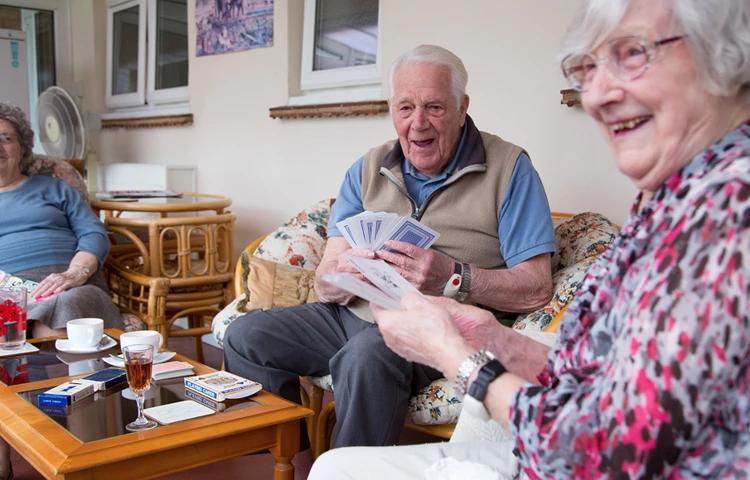 Residents playing cards at Abbeyfield House, Basildon SS14 1PG