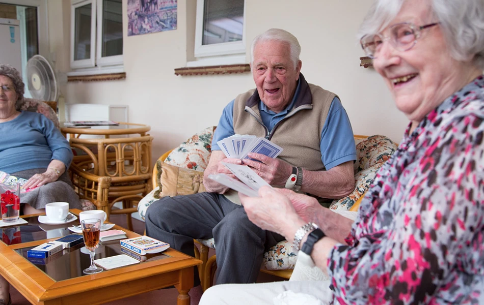 Residents playing cards at Abbeyfield House, Basildon SS14 1PG