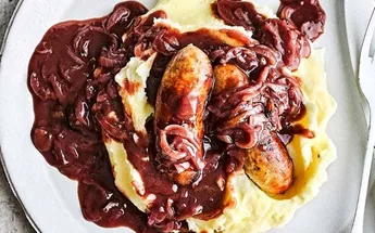Bangers and mash with onion gravy Image